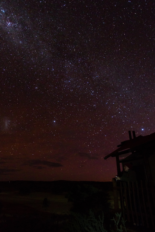 A well deserved glass of wine under the Milky Way and the Large Magellanic Cloud next to the tent at Kalahari Tented Camp, Kgalagadi Transfrontier Park.  Wow.